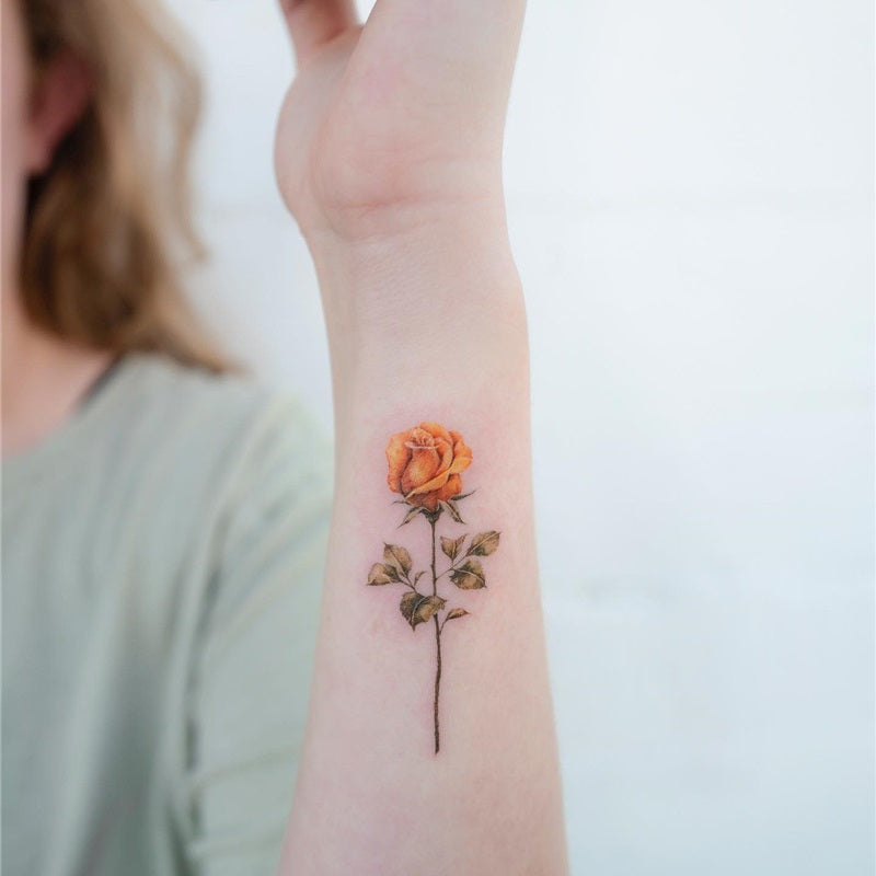 rose bush with thorns tattoo