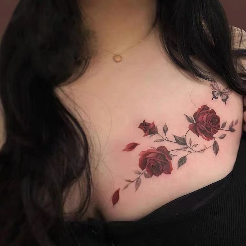 Rose Butterfly and flower tattoo on shoulder