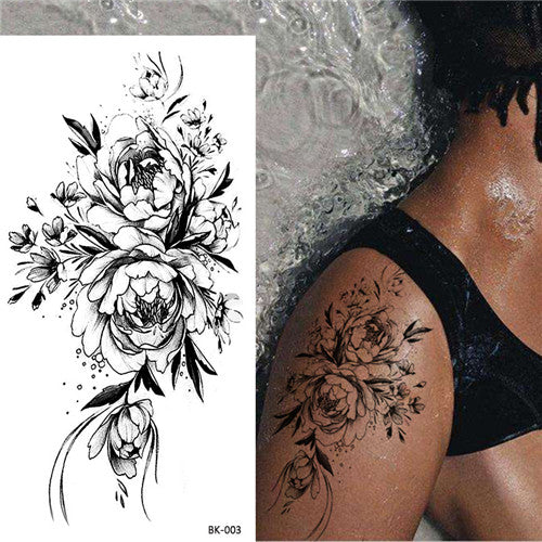 flower tattoos on the thigh