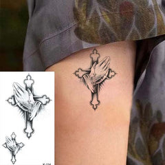 small cross hand temporary tattoo