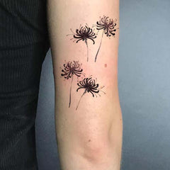 Small Black Spider Lily Tattoo