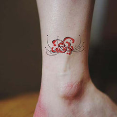 Small Red Spider Lily Flower Tattoo