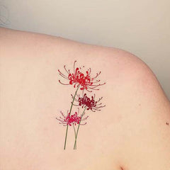 Small Watercolor Spider Lily Flower Tattoo
