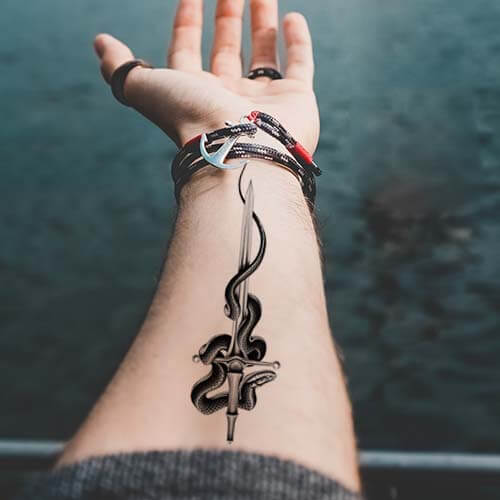 Snake And Sword Tattoo Meaning : Unveiling the Powerful Symbolism