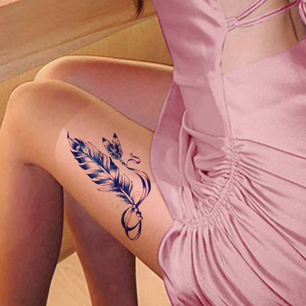 See more Colorful Peacock feather tattoo on legs | Feather tattoos, Peacock feather  tattoo, Peacock tattoo
