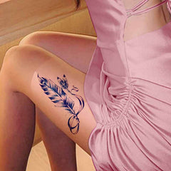 Feather Tattoo on Thigh