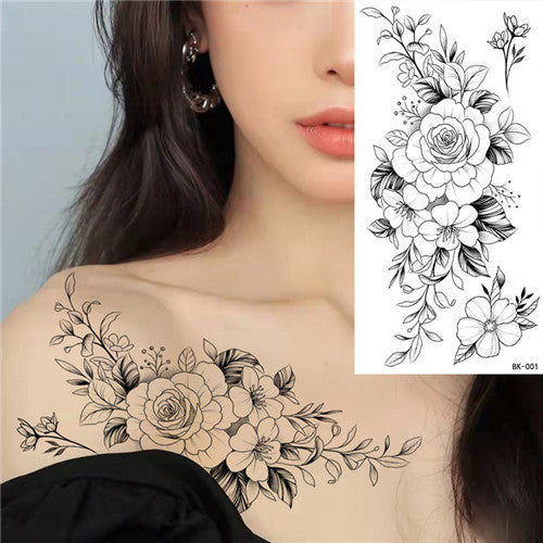 Fine Line Flower Chest Tattoo